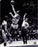 Walt Frazier Jump Shot over Jerry West 16x20 Photo